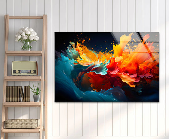 A fiery abstract splash print wall art features realistic, detailed explosions of vibrant red, orange, and blue hues on glossy tempered glass.