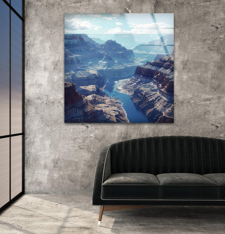 Dramatic canyon depths and a winding river create a mesmerizing glass wall art piece.
