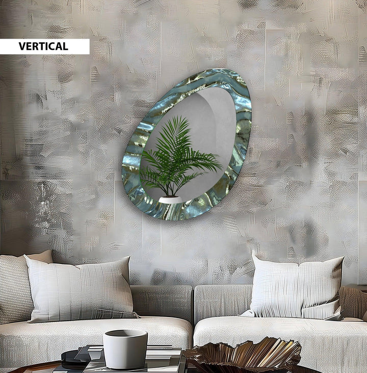 Mirror wall art with abstract shapes and reflective surfaces for a modern artistic vibe
