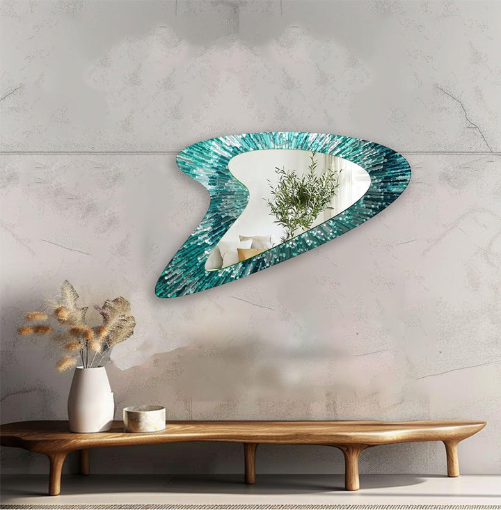 Decorative wall mirror blending artistic patterns with modern functionality for a unique look
