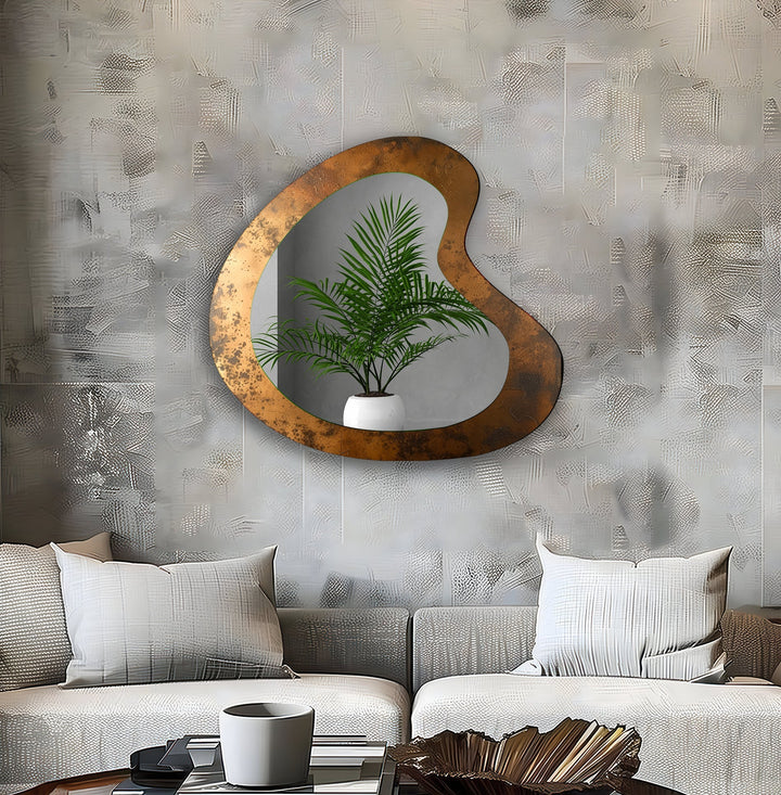 Decorative wall mirror blending artistic patterns with modern functionality for a unique look
