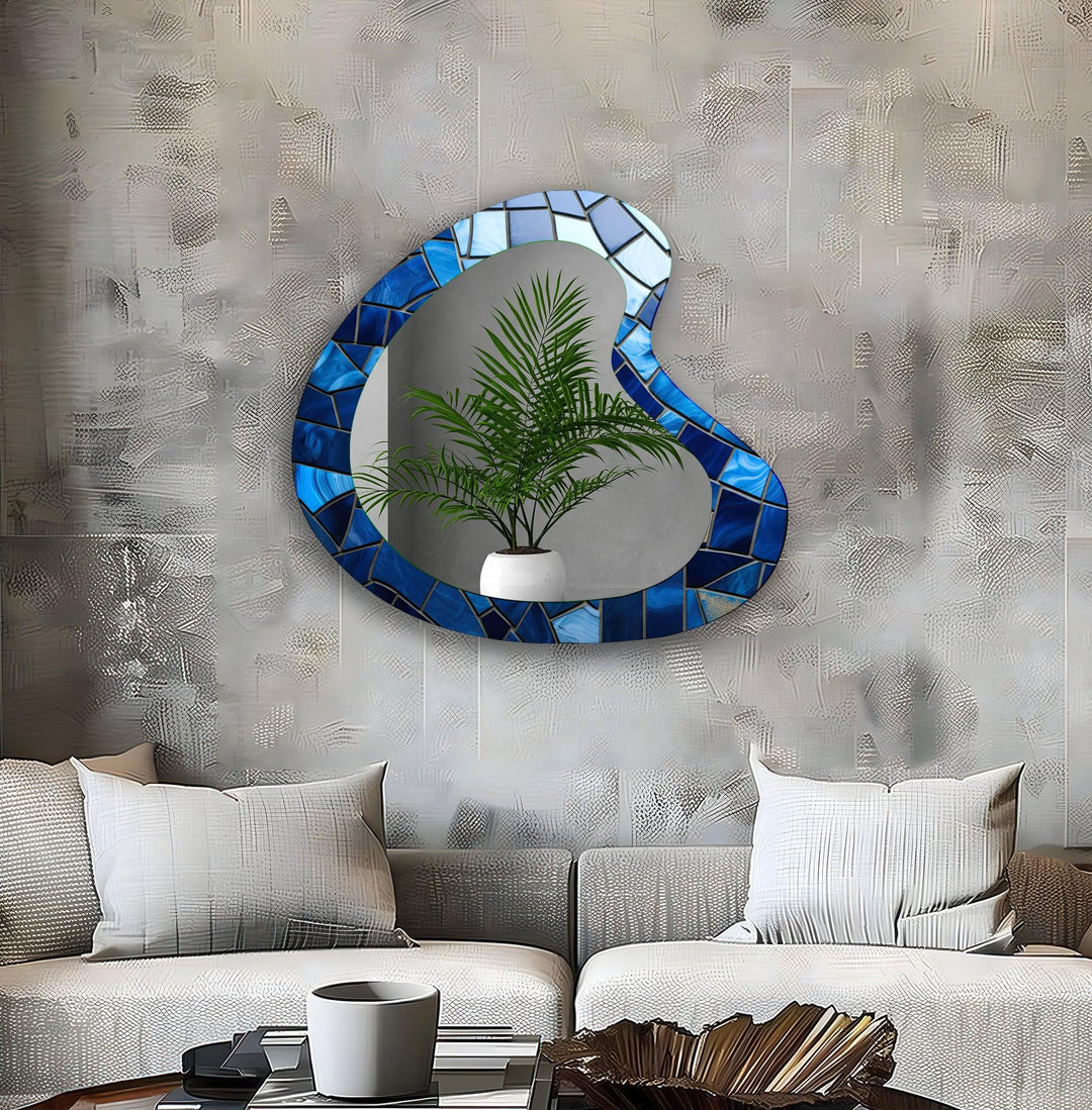 Decorative wall mirror blending artistic patterns with modern functionality for a unique look
