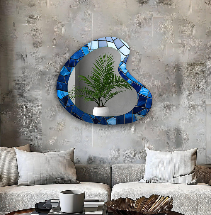 Decorative wall mirror blending artistic patterns with modern functionality for a unique look
