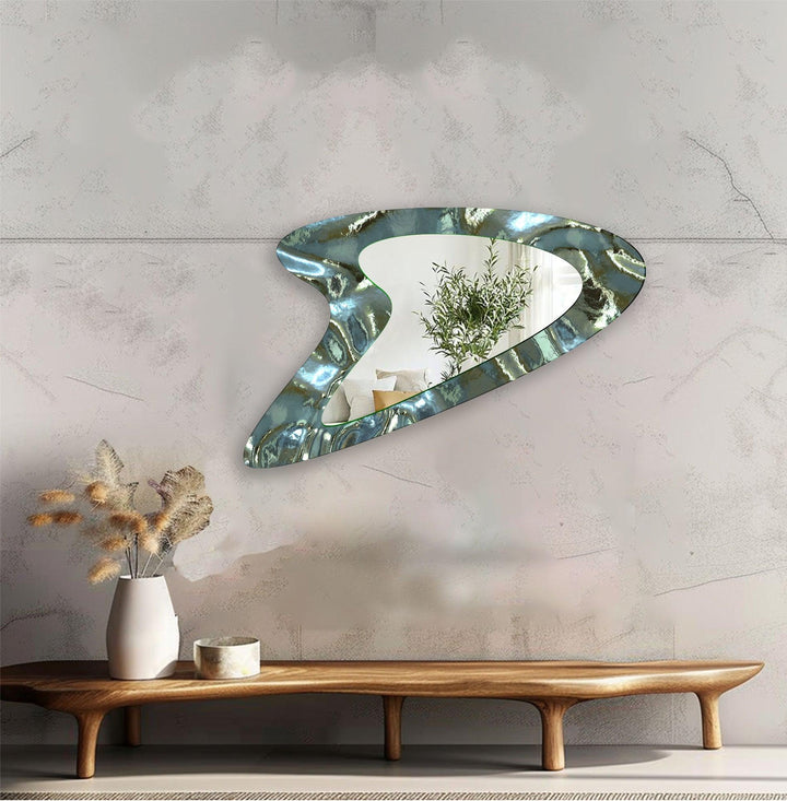 Mirror wall decor combining bold shapes and reflective surfaces to create a striking focal point
