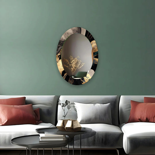 Asymmetric mirror oval shape black and gold abstract frame reflecting a plant a luxurious abstract design on a green wall