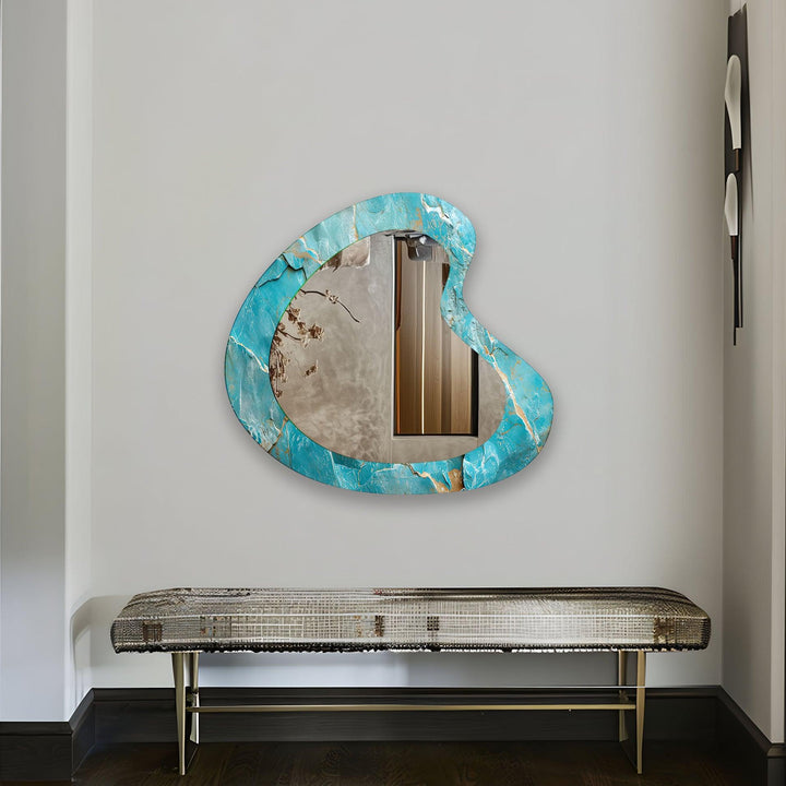 Mirror wall art with abstract shapes and reflective surfaces for a modern artistic vibe
