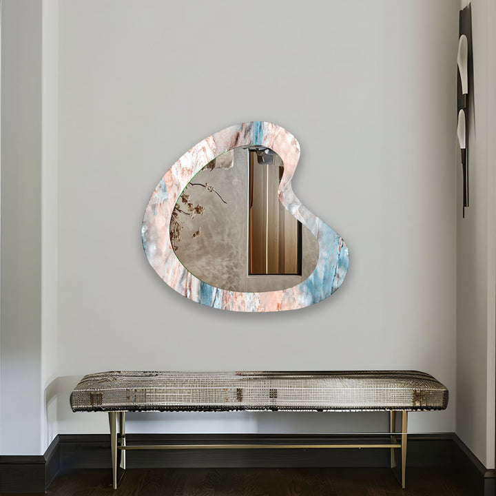 Decorative wall mirror with intricate detailing, perfect for enhancing any interior space
