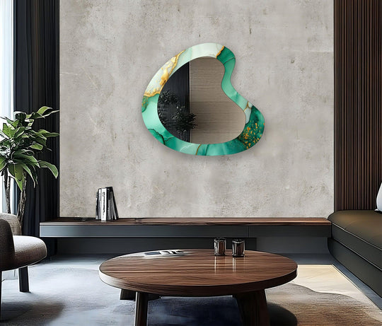 Fluid, green alcohol ink patterns embellish the edge and borders of this kidney-shaped modern mirror, a distinctive accent for stylish wall prints.