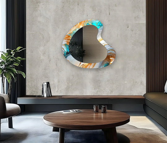 Featuring organic curves, the turquoise marble asymmetric framed wall mirror adds fluid movement and reflective style to this contemporary space.