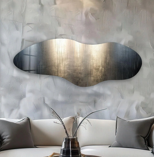 An irregular, asymmetrical silver glass art piece in a horizontal orientation.