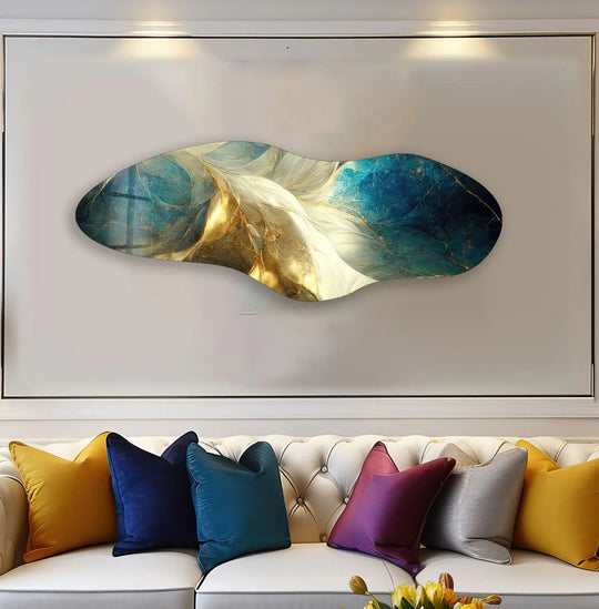 Irregular asymmetrical shiny abstract art from glass with a luxurious, reflective finish of gold and deep blues.