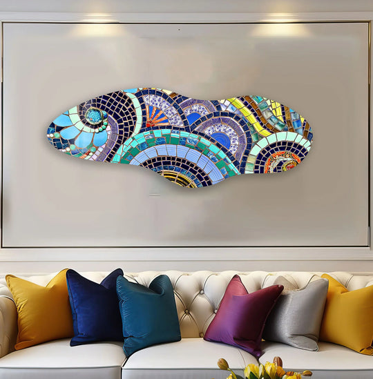 A vibrant, asymmetrical mosaic fish made of colorful glass tiles is the eye-catching focal point, showcasing the best glass art.