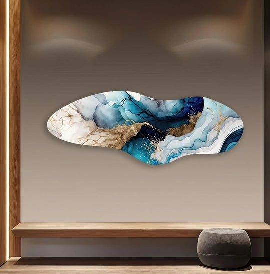 Soft shadows highlight the undulating curves of the irregular asymmetrical blue alcohol ink glass wall art, a stunning piece of decorative wall art.