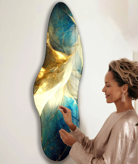 Shiny abstract glass wall art featuring opulent gold and deep sapphire blue marbling, showcasing premium material quality.