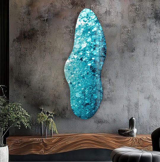 Irregular asymmetrical glass art features a vibrant, abstract turquoise water bubble design in the center.