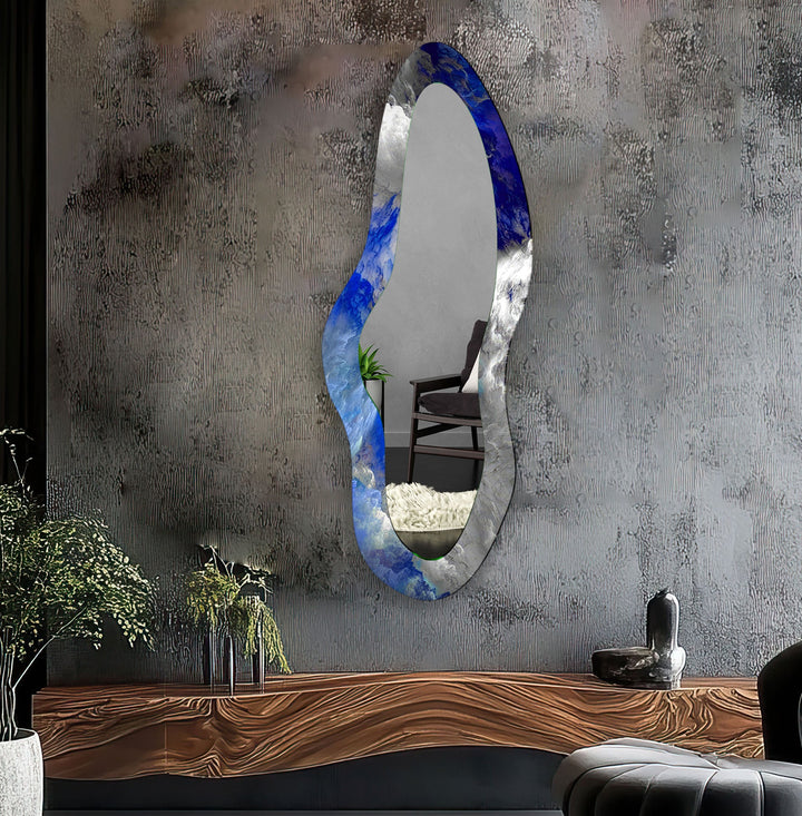 Mirror wall decor combining bold shapes and reflective surfaces to create a striking focal point
