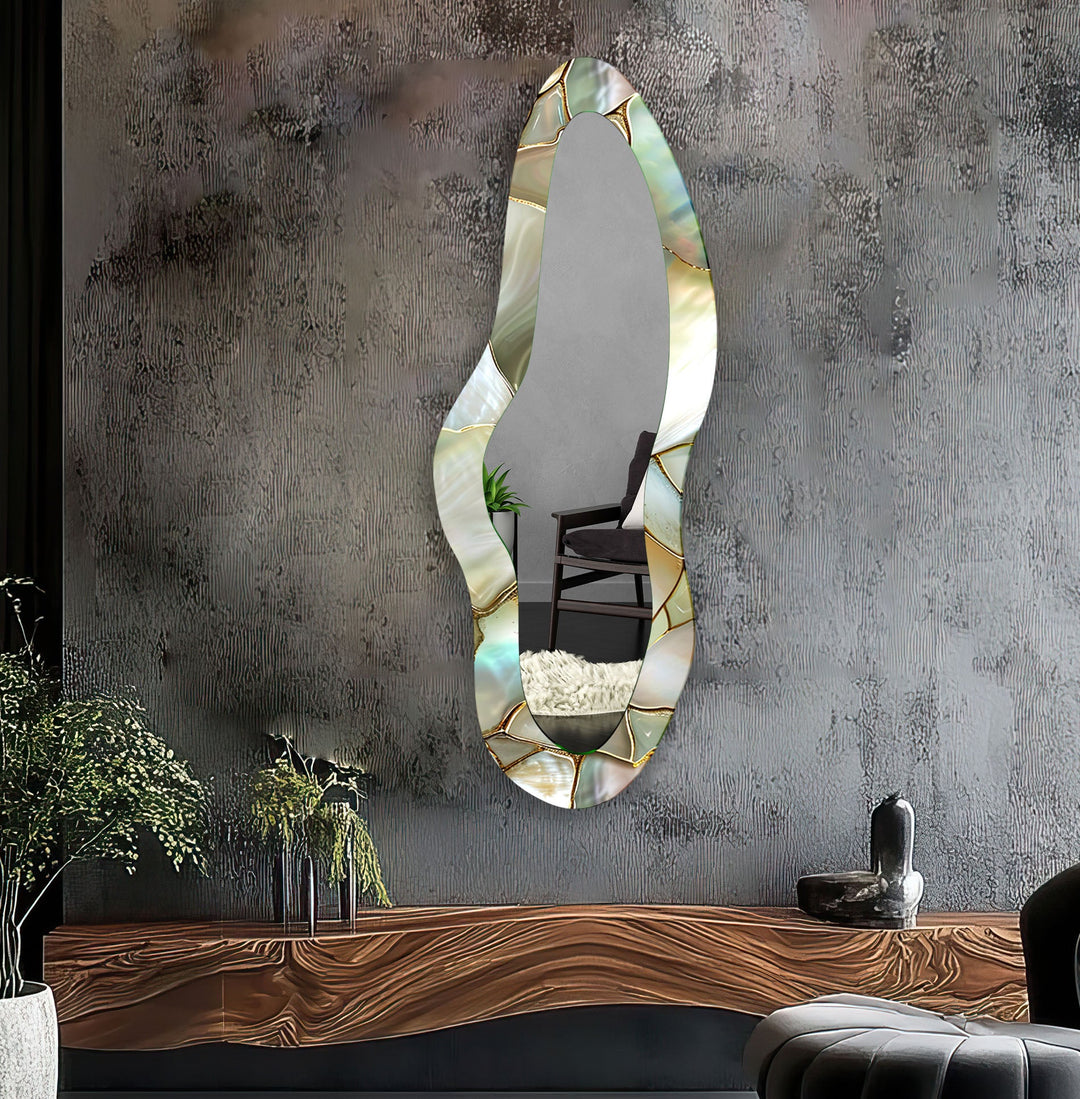 Decorative wall mirror with intricate detailing, perfect for enhancing any interior space
