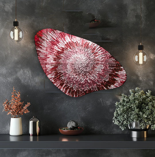 A dark, textured wall frames an abstract red and white glass wall art, complemented by sophisticated home decor elements.