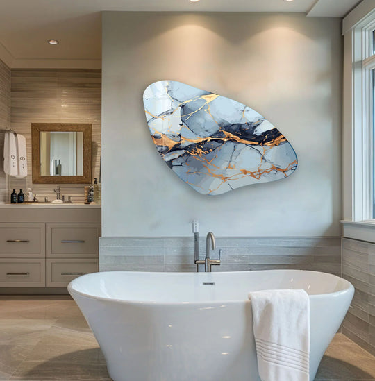 Aesthetically pleasing gold and blue marbled glass wall prints feature a bright, illuminated abstract design with striking gold accents.