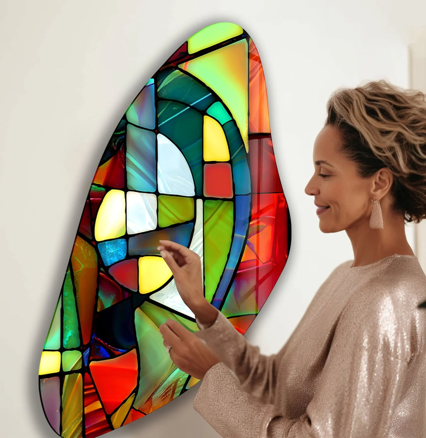 Dominant red and green hues define this irregular glass wall art, a vibrant piece of home decor that features a stained glass design in asymmetric patterns.
