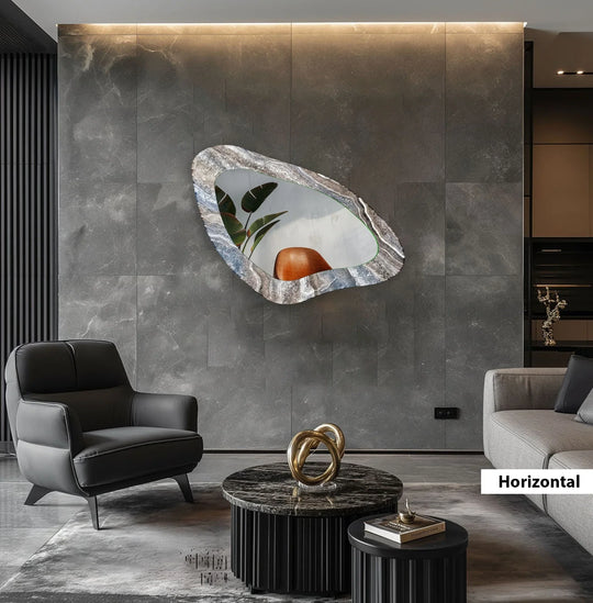 Asymmetric gray marble mirror for wall decor features a unique irregular shape with a marbled border, blending modern home decor seamlessly.