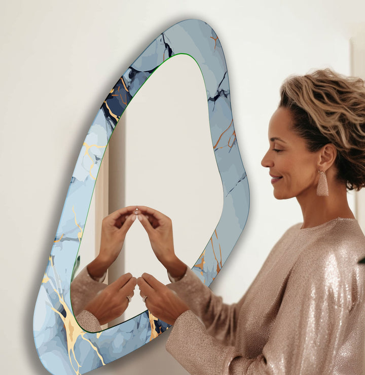 Decorative wall mirror blending artistic patterns with modern functionality for a unique look
