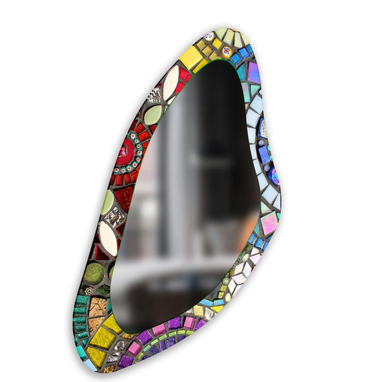 Visual rhythm is created by the mosaic detailing around this irregular asymmetrical large wall mirror, offering a unique stained glass wall mirror effect.