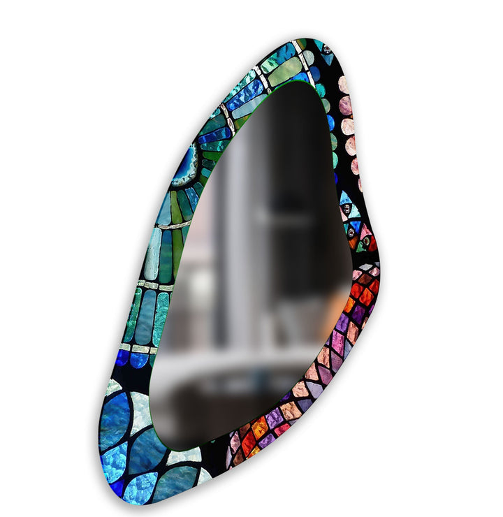 Decorative wall mirror with intricate detailing, perfect for enhancing any interior space
