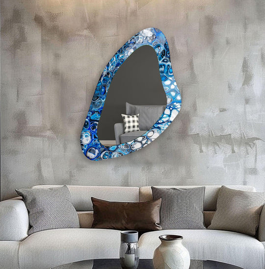Reflecting light with its blue watercolor design, the framed wall mirror becomes the focal point, elevating modern decor with artistic expression.