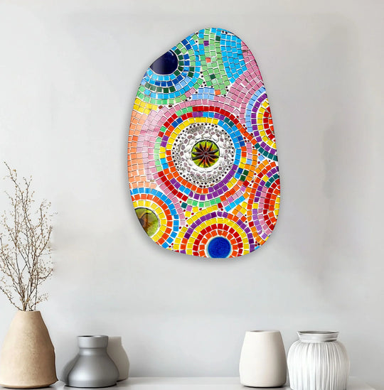 Abstract pink mosaic tile glass art painting flows with a vibrant visual rhythm of concentric circles and colorful tessellations.