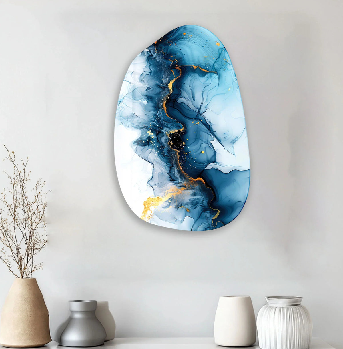 An abstract oval-shaped unique modern wall decor with swirling navy and sapphire ink with gold accents.
