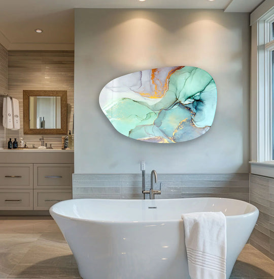 Serene turquoise and gold abstract glass art creates a tranquil and luxurious mood in this modern bathroom.