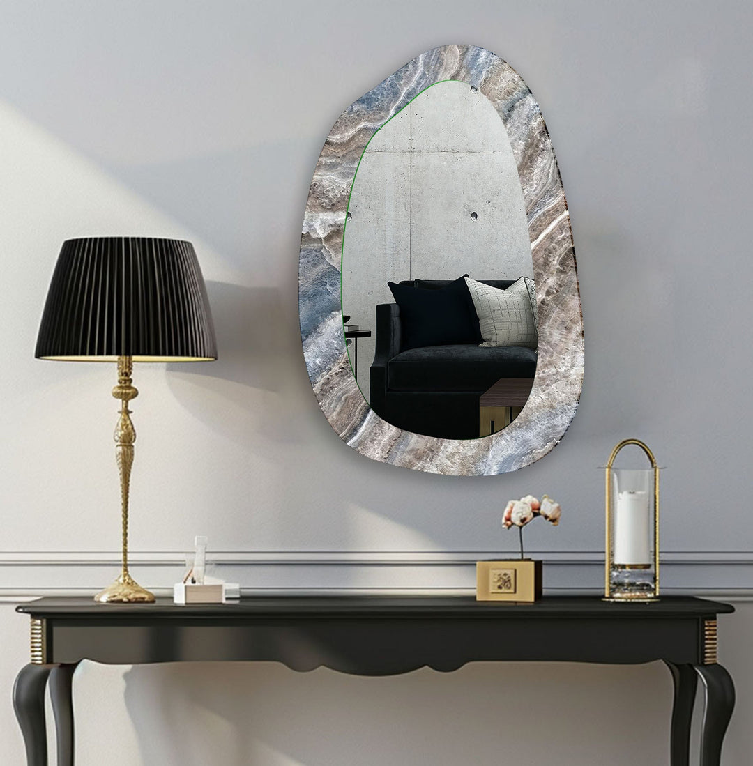 Mirror wall decor combining bold shapes and reflective surfaces to create a striking focal point
