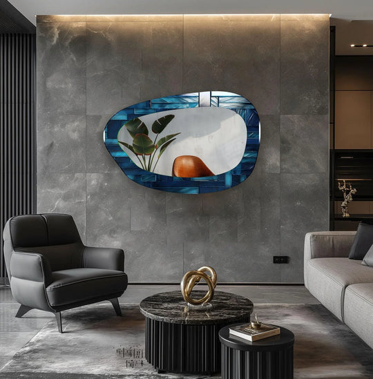 Sharp color contrast highlights the vibrant blue mosaic tiles in this large, asymmetric bathroom framed wall mirror, a stunning focal point.