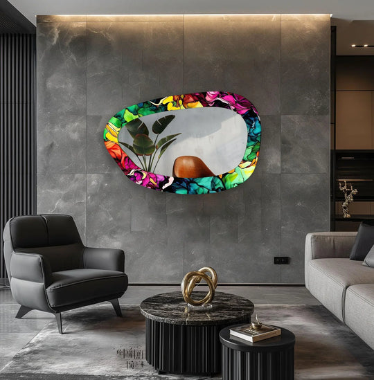 Reflecting depth and layers, the asymmetrical glass wall mirror for wall decor adds dimension with its vivid colors and a layered, organic frame.