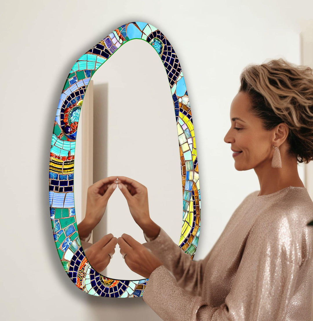 Decorative wall mirror blending artistic patterns with modern functionality for a unique look
