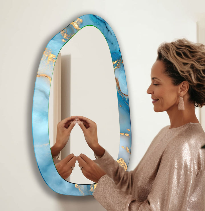 Mirror wall decor combining bold shapes and reflective surfaces to create a striking focal point

