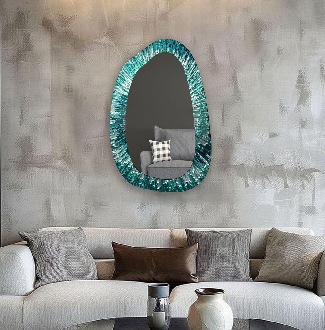 Decorative wall mirror blending artistic patterns with modern functionality for a unique look
