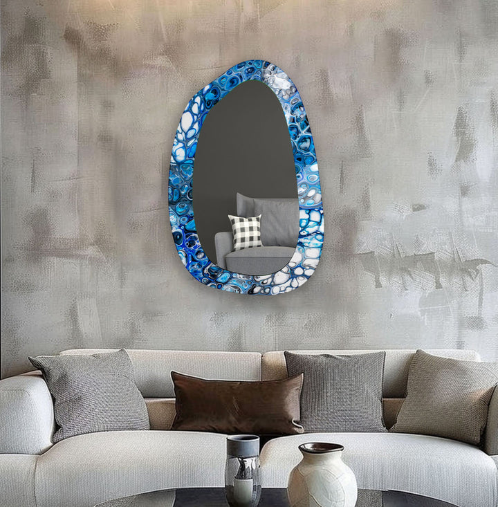Decorative wall mirror with intricate detailing, perfect for enhancing any interior space
