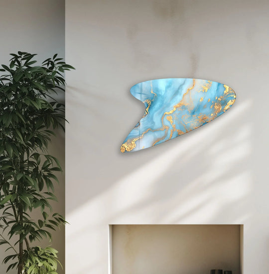 The softest element of the azure and gold marble glass art creates a dreamy watercolor effect on the wall.