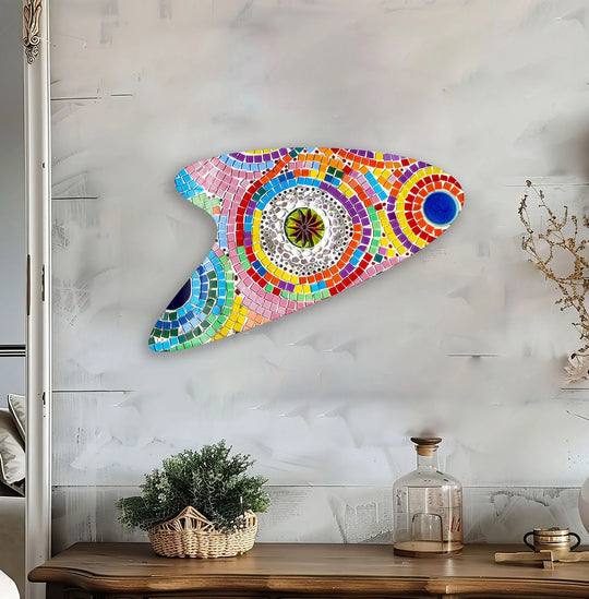 A vibrant pink mosaic irregular glass hanging wall art displays a kaleidoscope of textured, shimmering tiles in abstract patterns.
