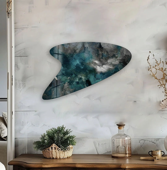 Deep, saturated emerald and navy blues dominate this striking irregular glass wall art with abstract textures.