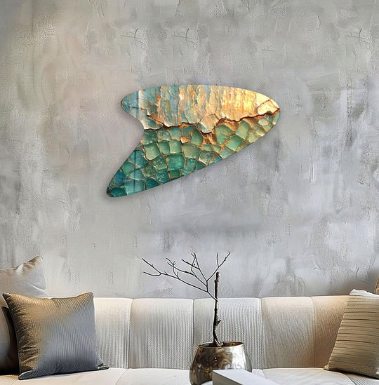 Abstract glass wall art prints feature cracked green and gold textures in an irregular shape.