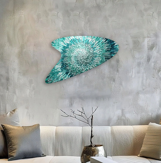 Intricate, high-quality glass pieces form a vibrant turquoise abstract sunburst, showcasing exquisite hanging wall art craftsmanship.
