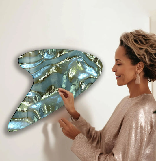 Abstract glass wall art prints with iridescent green and blue hues, reflecting light with realistic detail.