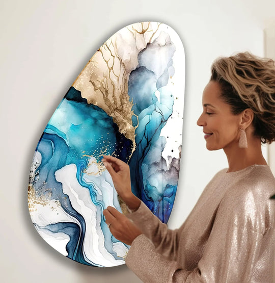 Abstract fluid blue and gold print wall art offers a captivating visual rhythm with its flowing textures and organic shapes.