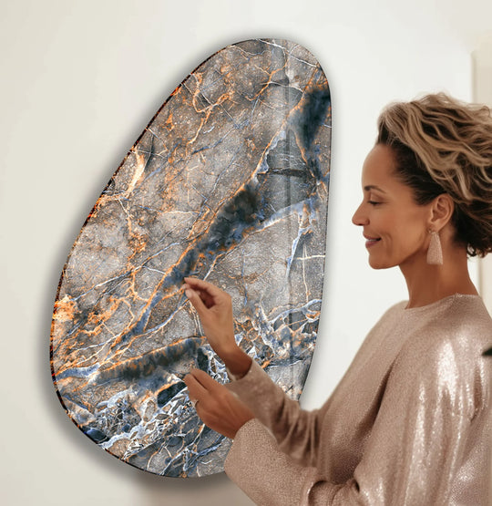Elegant beige marble decorative wall art showcases organic forms and natural lines on a unique asymmetric shape.