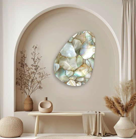 Iridescent abalone shell mosaic glass wall artwork features an abstract organic shape with iridescent shell pieces framed by gold.