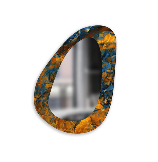 Textured foreground detail of this living room wall mirror highlights the swirling blue and gold patterns, enhancing this asymmetrical bathroom mirror.