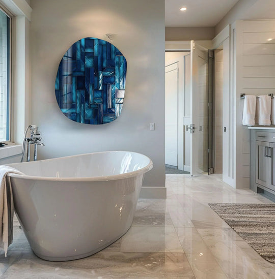 A bright, reflective abstract navy blue glass wall art featuring shimmering geometric shapes with a glass wall prints finish.